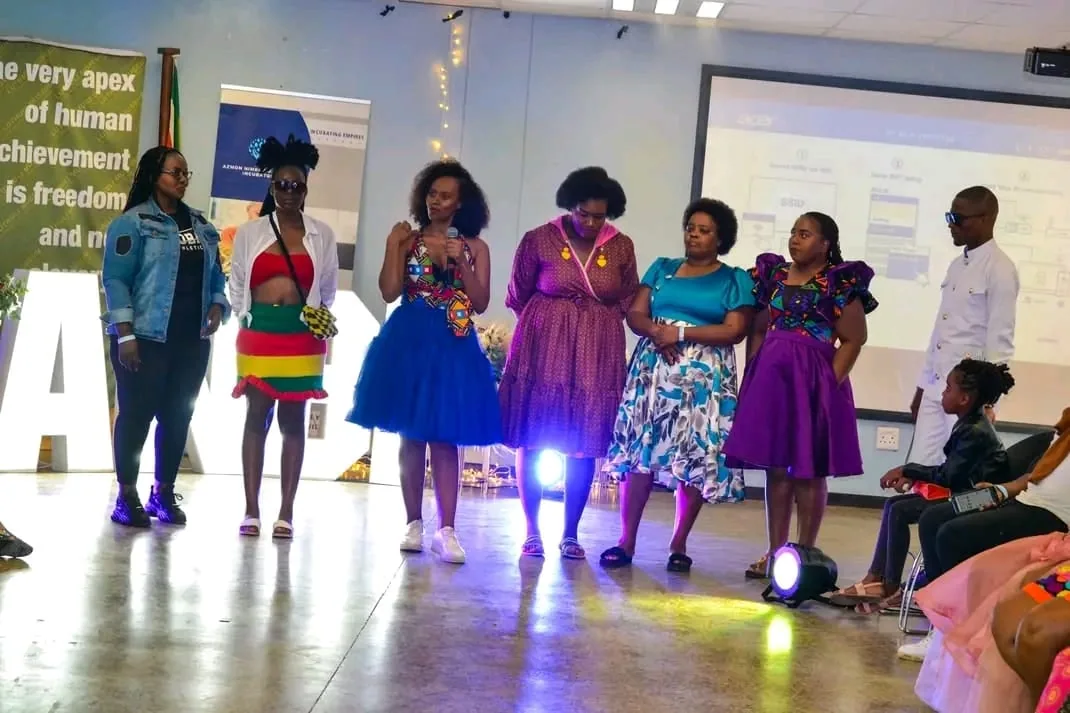 A line-up of models in colourful outfits at the ANBI fashion showcase