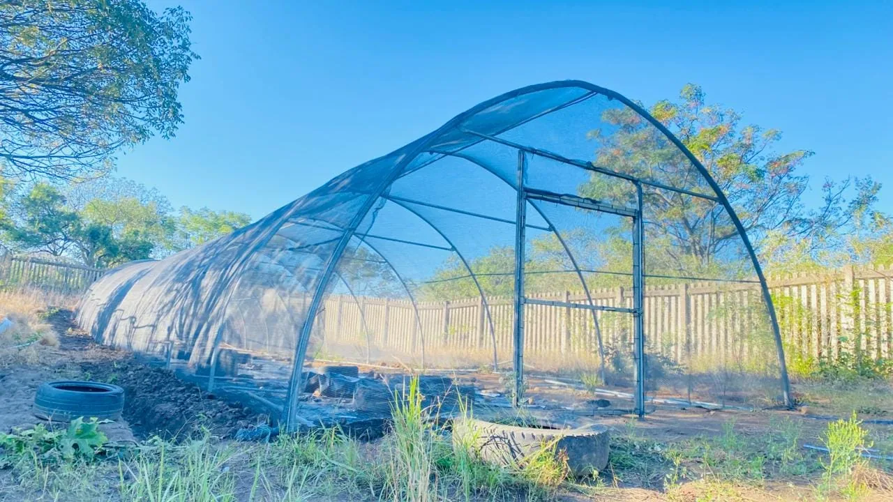 A shade-net growing tunnel on an ANBI-supported agroecology plot